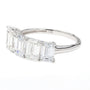 A silver five-stone diamond ring featuring baguette-cut diamonds set in a polished 14K silver band, shown on a clean white background.
