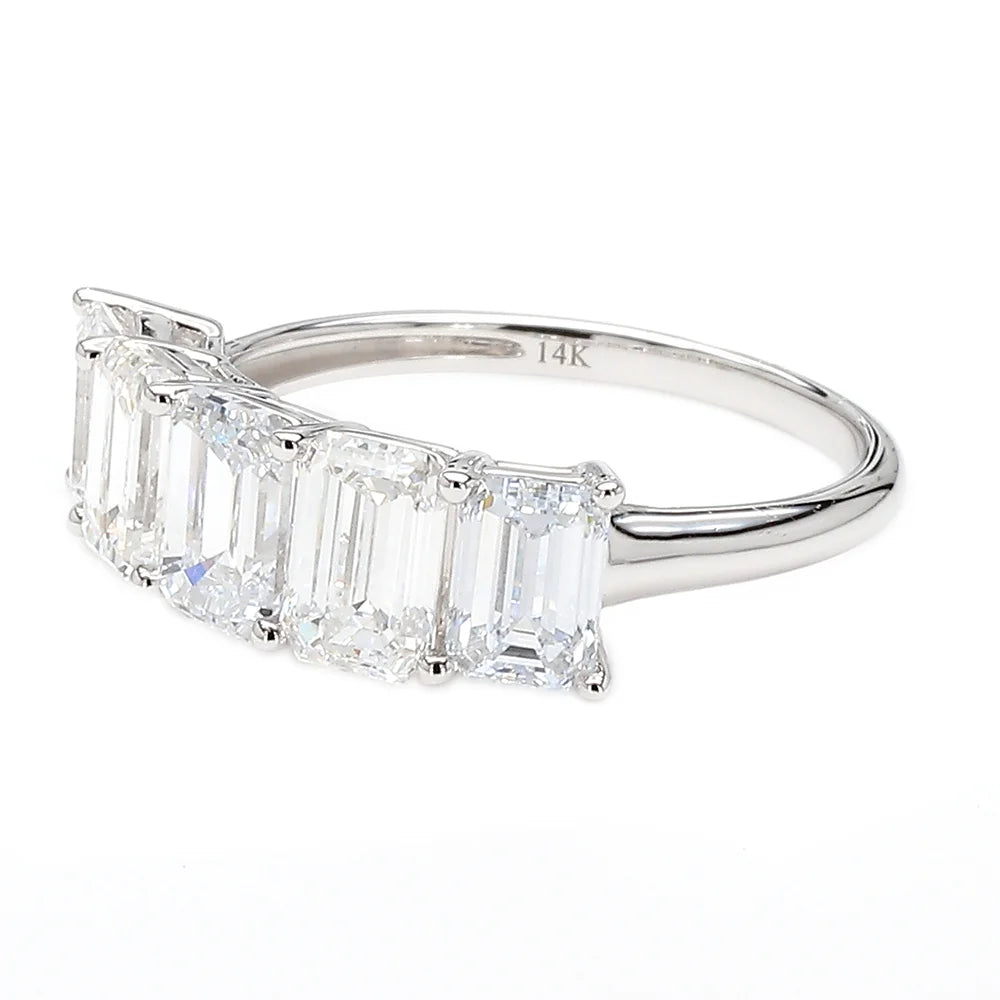 A silver five-stone diamond ring featuring baguette-cut diamonds set in a polished 14K silver band, shown on a clean white background.