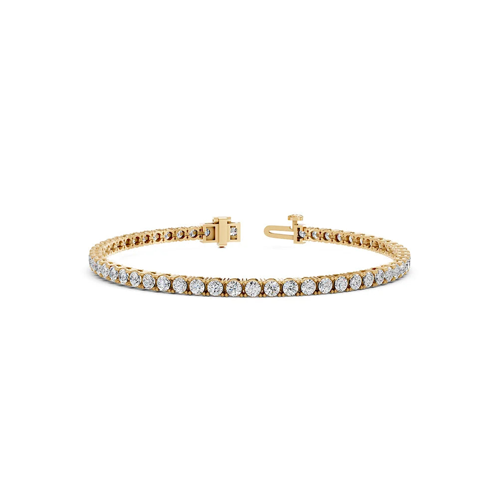 A yellow gold tennis bracelet featuring a single row of round-cut clear gemstones, displayed on a clean white background.
