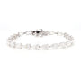 A silver tennis bracelet featuring marquise and round-cut clear gemstones, displayed on a clean white background.