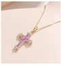 18K Yellow Gold Pink Sapphire Iris Cross Pendant, approx. 3 g total weight