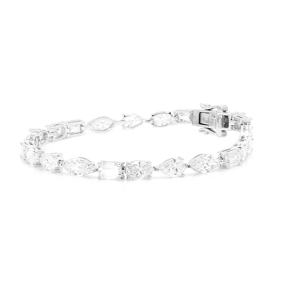 A silver tennis bracelet featuring a series of marquise and rectangular-cut clear gemstones, displayed on a clean white background.