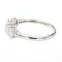A silver-toned diamond ring with a cluster of marquise-cut and round diamonds, shown in a side profile view on a white background.